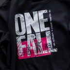 Detail shot of print quality on Cut 001 black hoodie showing fabric texture and design clarity.